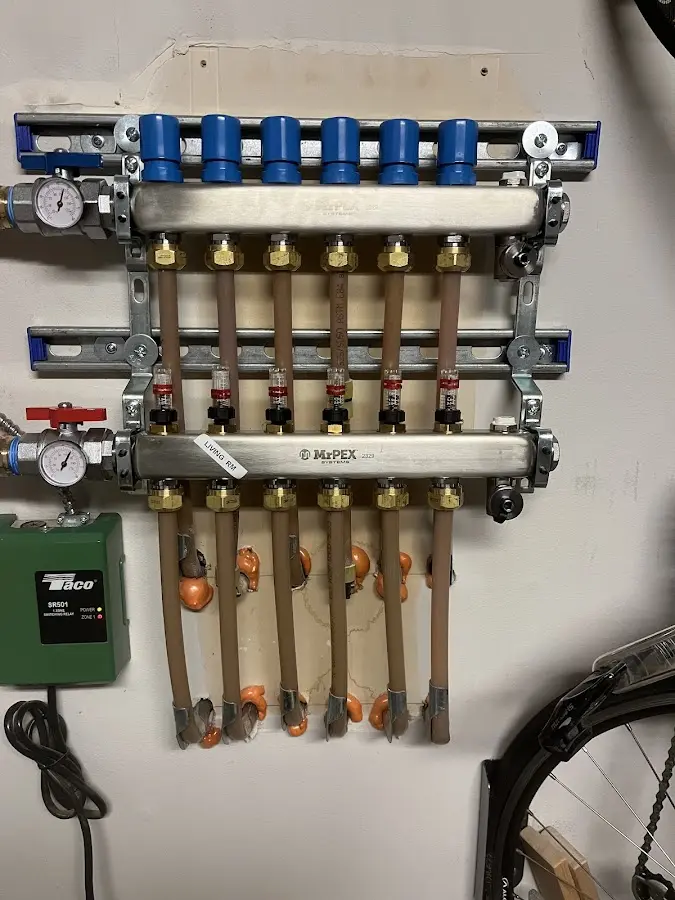 Plumber performing Water Heater Repair at a residential property in Bradley Beach